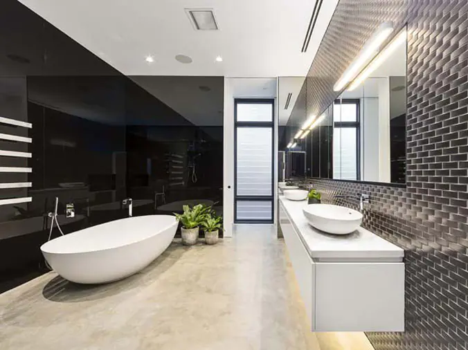 BAthroom with free standing bathtub and basin sink